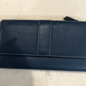 Teal blue coach wallet with fuchsia inside